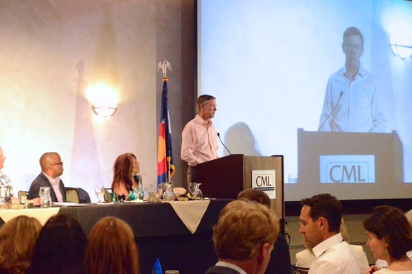 Governor John Hickenlooper addresses the crowd. - Colorado Municipalities